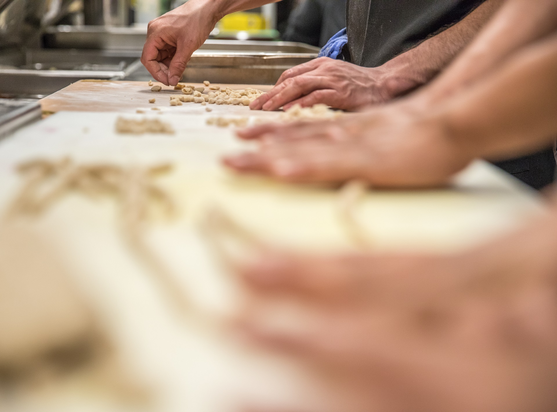 Close up of hands making pasta
